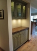 bar cabinets - upper with glass doors & lights - lower with alder bar top