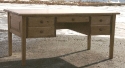 pine - tapered legs - raised panel sides -  5 drawers