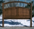 alder - arch top frame with 2 raised panels - metal accents - king size